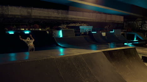 young roller athlete practicing on ramp skate park. active man in roller skates.