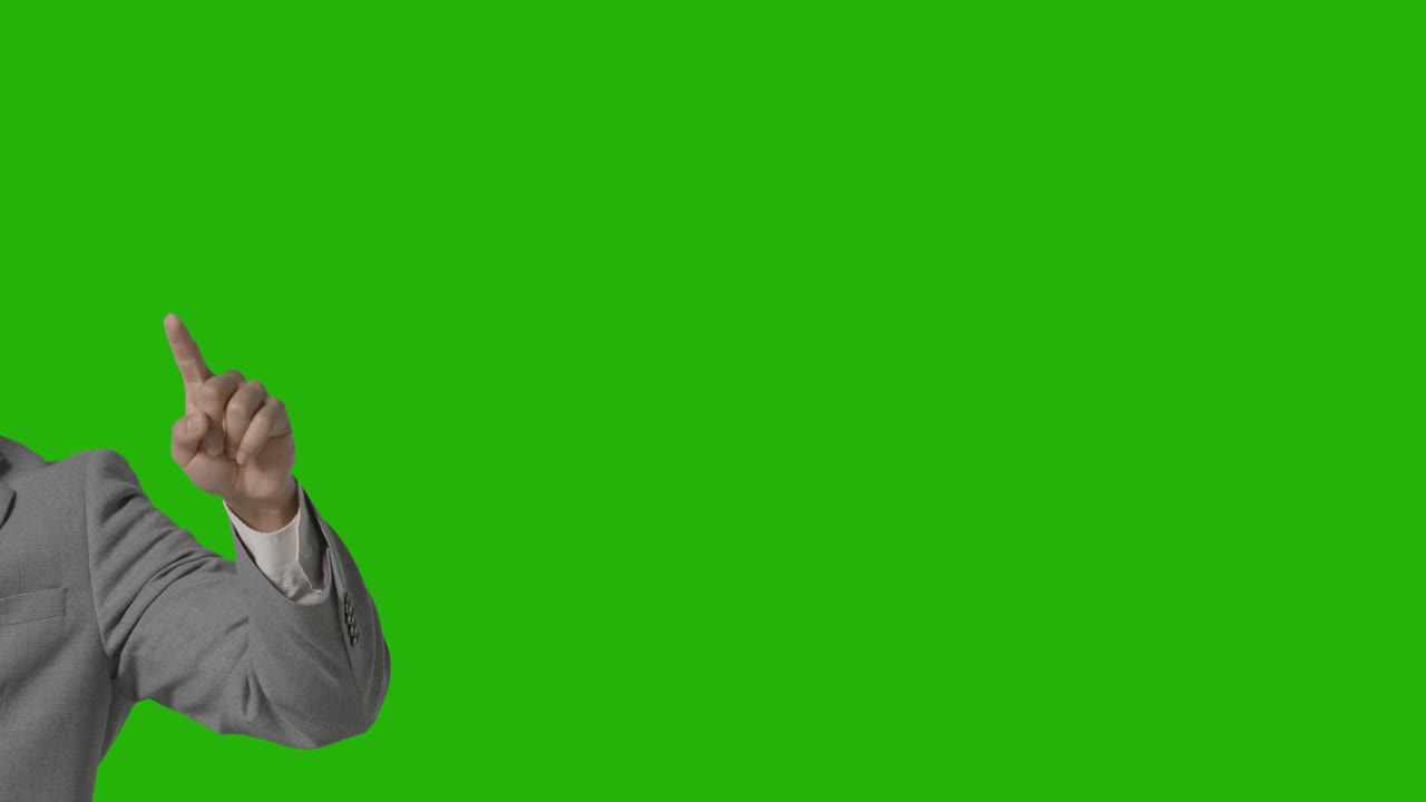 Close Up On Hand Of Businessman In Suit Pretending To Use AI Or VR Against Green Screen 