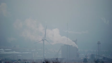 smoke emission from a facility next to a wind turbine