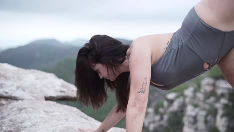 yoga pose outdoors in mountain scenery
