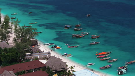 exotic seascape with boats in zanzibar shore in africa