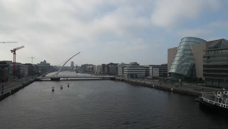 drone shot of dublin city centre including the convention centre and the samuel beckett bridge