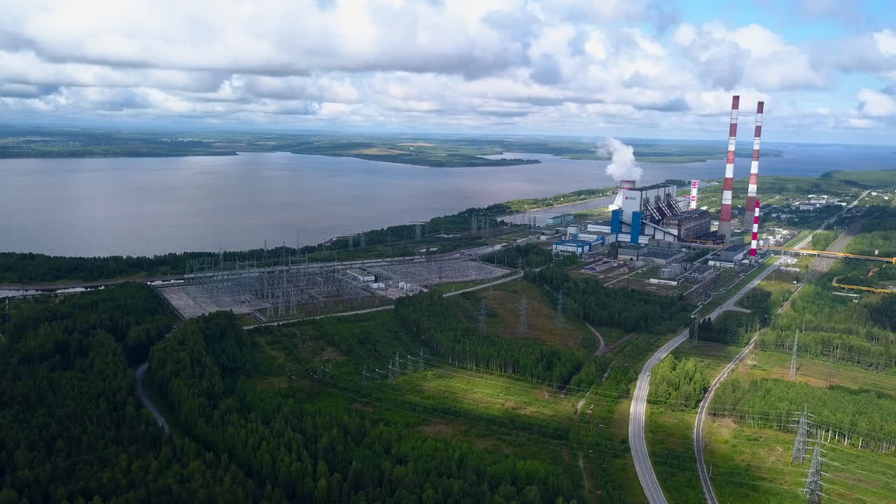 Aerial View of a Power Plant by a Lake