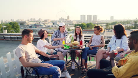 friends having fun on a rooftop party