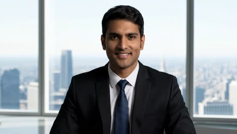 portrait of a smiling businessman in a modern office
