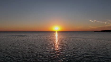 Aerial-view-of-the-sun-over-Mobile-Bay-Alabama-while-setting