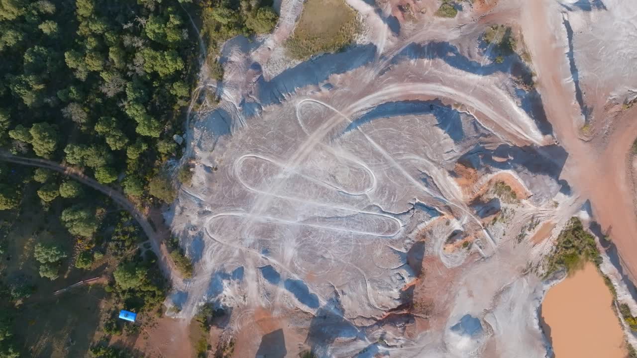 An abandoned mine site in Dehesa Extremeña is now used as a motorbike track