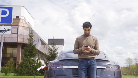 Young-man-looking-at-camera-outdoors