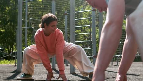 Friends-stretching-outdoors