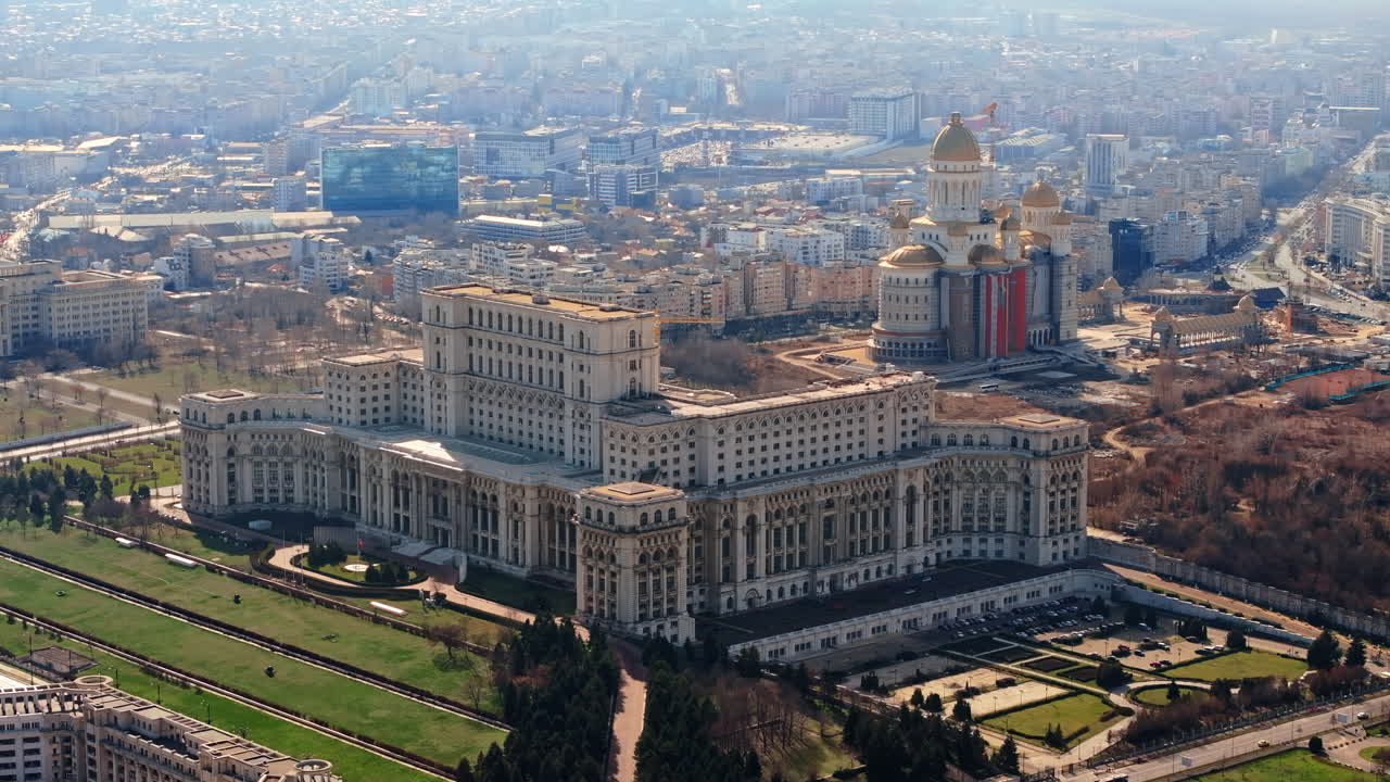 Aerial drone view of Palace of the Parliament in Bucharest downtown in sunlight. Romania