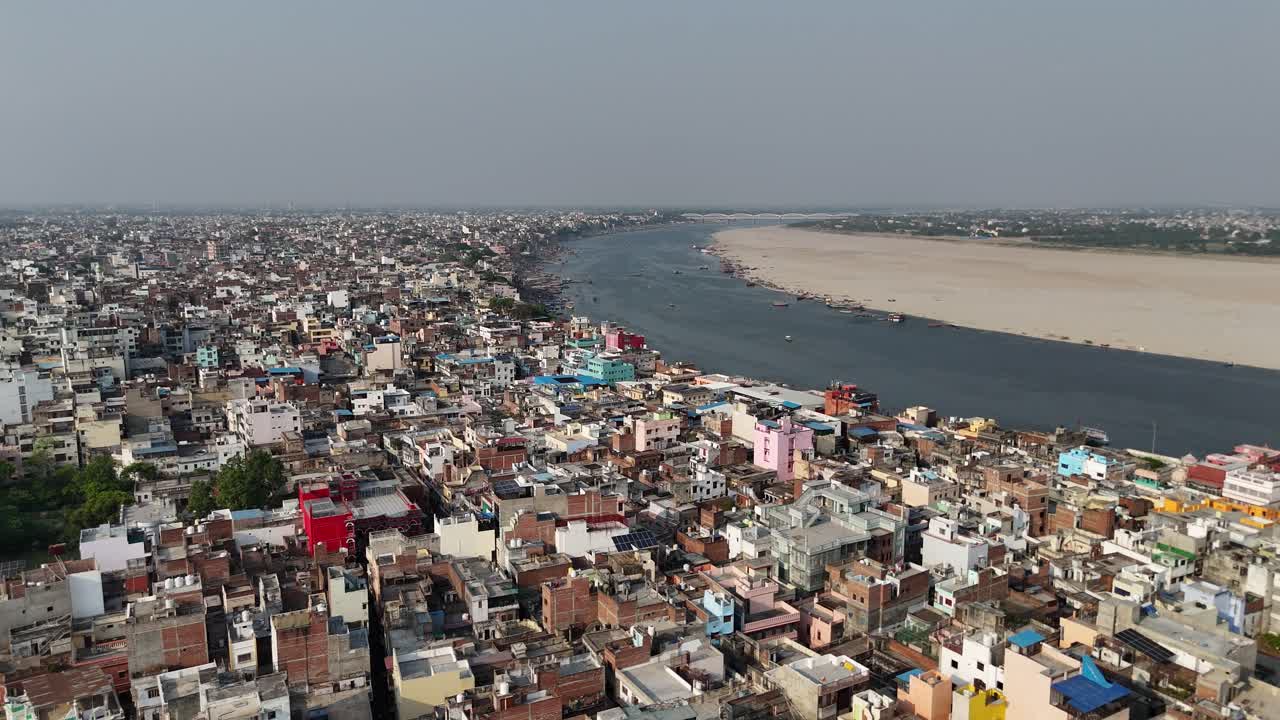 Overhead footage of Varanasi's dense residential areas, where life moves in rhythm with the sacred Ganges.