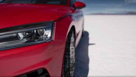 red sport car on the salt lake