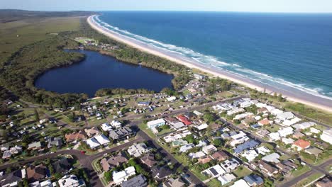 lennox head seaside village and lake ainsworth in northern rivers in nsw, australia. - aerial shot