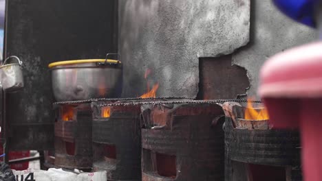 oil drum barbecues in street stall