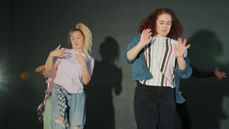 teenage girls dancing in studio