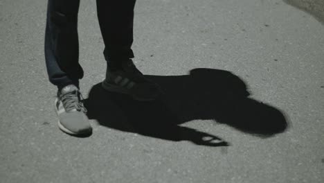 Man's-shaddow-smokes-at-street