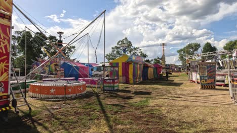 setting up a colorful carnival ride in fast motion