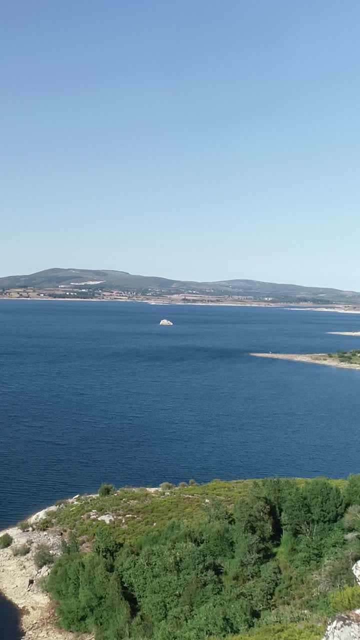 Beautiful Nature Landscape. Blue Lake and Green Mountains Vertical Video