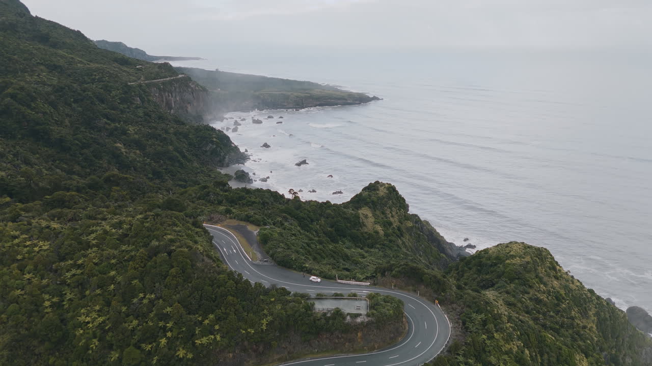 Coastal Road Through New Zealand Mountains