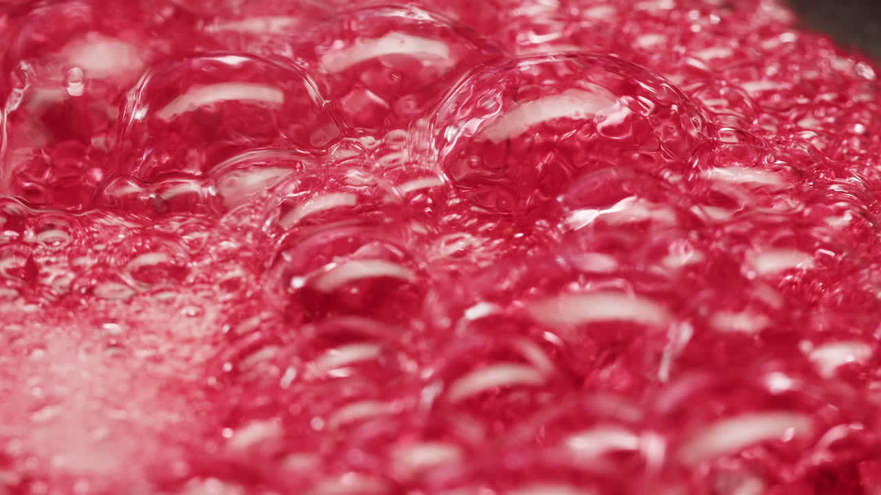 Frozen cranberries cooking for tea or jam, Background Close up of cranberry berries in on the kitchen, chef making dessert healthy pie.