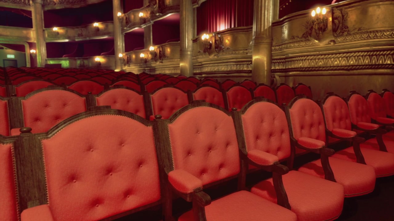 Sontuose poltrone rosse in peluche con braccioli decorati e illuminazione calda