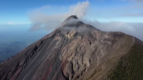 acatenango volcano belches black smoke, erupting into cloud, guatemala