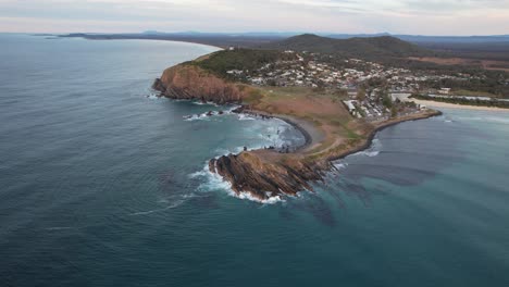 Crescent-Head---Goolawah-Beach---Pebbly-Beach---New-South-Wales--NSW---Australia---Pull-Back-Over-Ocean-Aerial-Shot