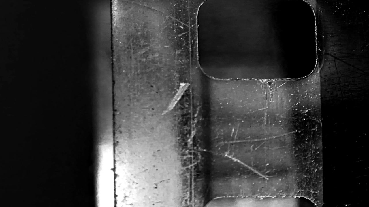 Primo Piano di Pellicola Cinematografica Vintage da 35mm in Movimento
