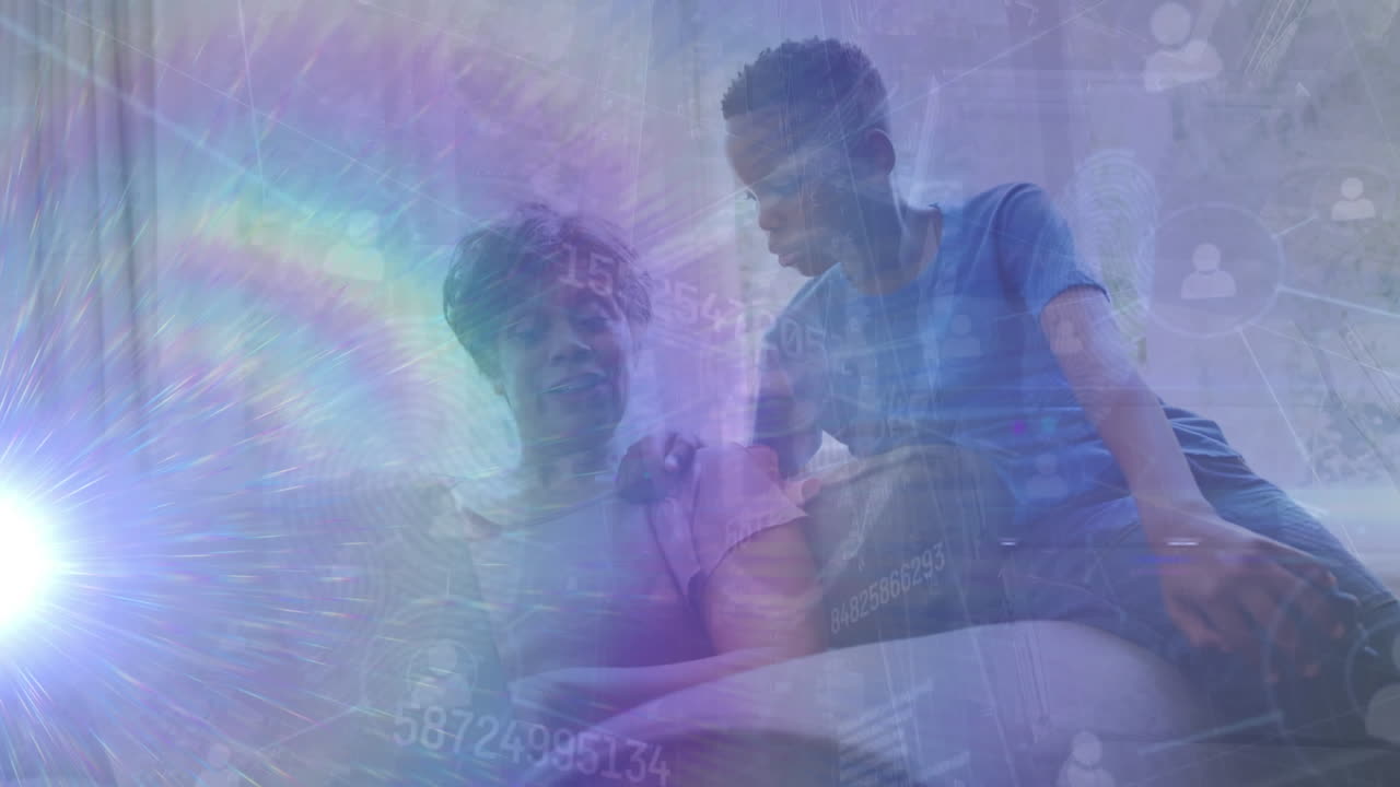 Animation of data processing over senior african american woman with grandson using laptop