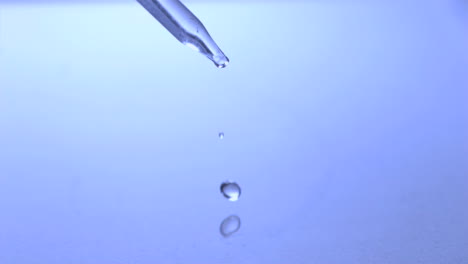 drop falling off pipette in super slow motion