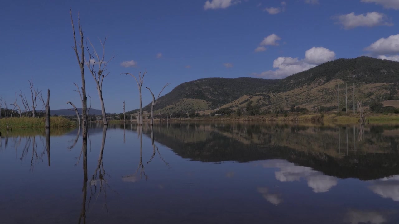 Blue Sky Reflecting On Lake Somerset In Queensland, Australia - Wide Shot