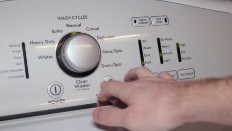 turning on, setting, and starting a washing machine