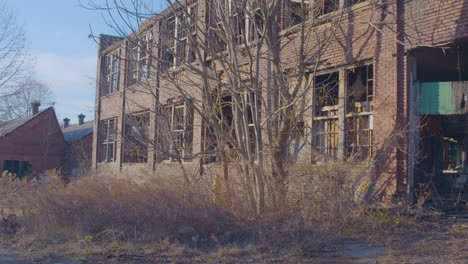 pan-shot-of-abandoned-factory-in-fall