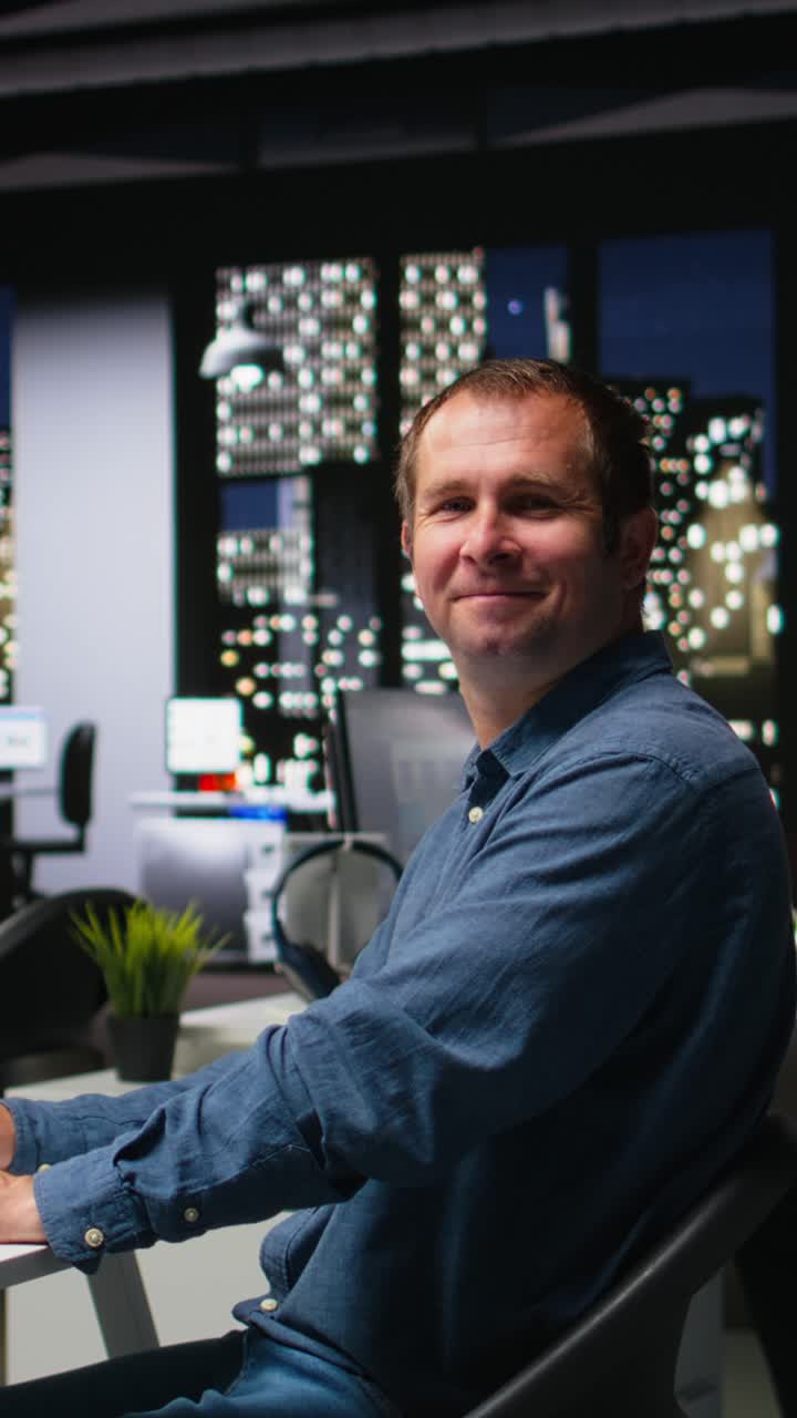Vertical Video Portrait of engineer working on floor plan interior design at computer