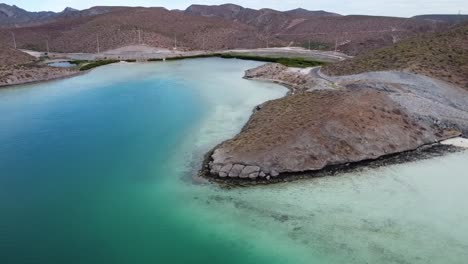 Playa-balandra's-clear-turquoise-waters-and-unique-shoreline-in-baja-california,-aerial-view