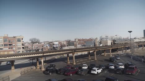 wide shot of train passing by chicago