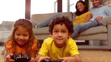 smiling hispanic family in the living room