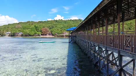 pier bridge on karampuang island, mamuju, west sulawesi, indonesia