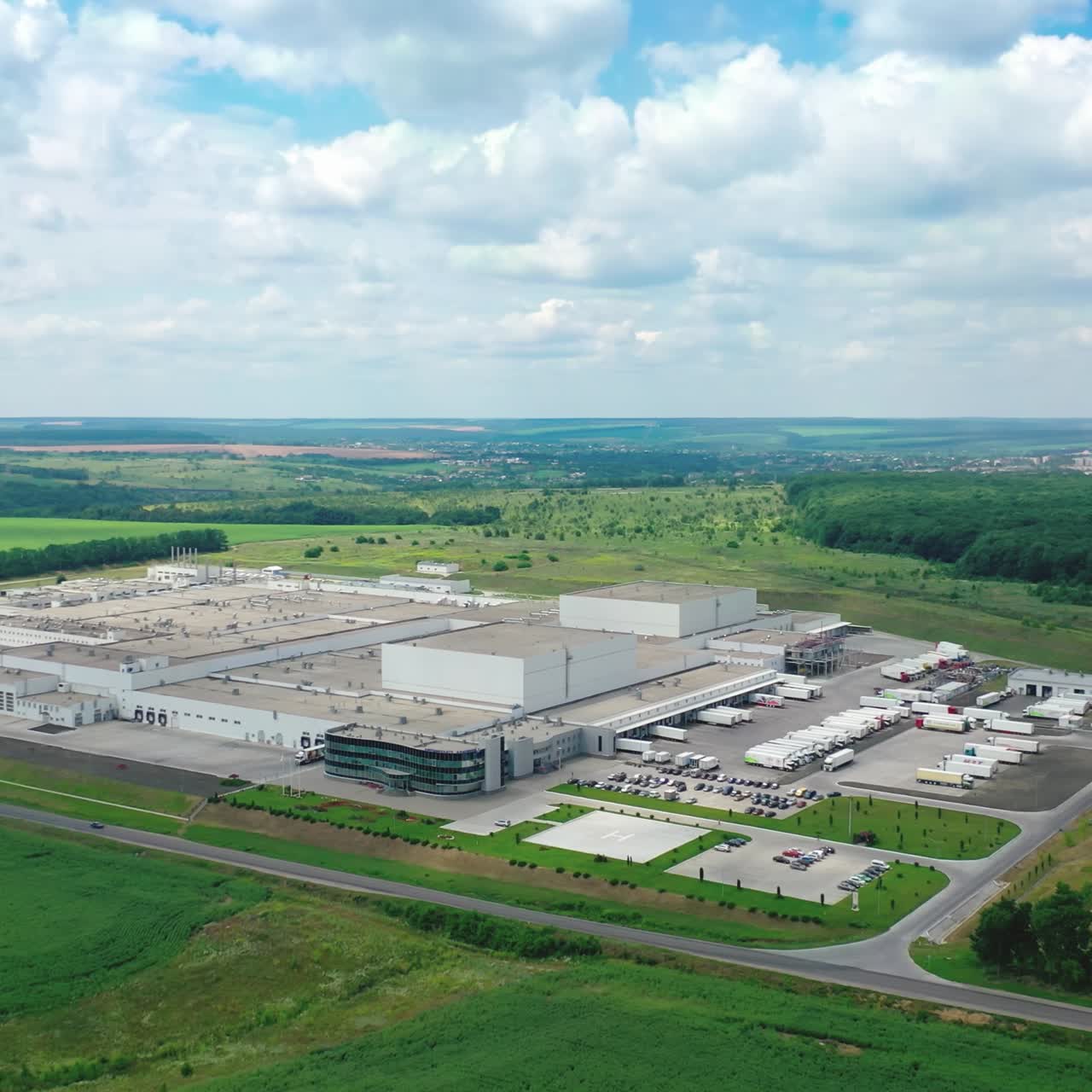 Aerial view of a large modern industrial factory. Industrial background. Logistics from above