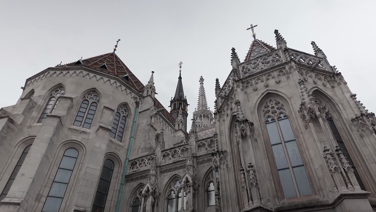 Tilt up ornate Gothic architecture facade of Matthias Church, Budapest