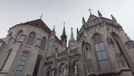 tilt up ornate gothic architecture facade of matthias church, budapest