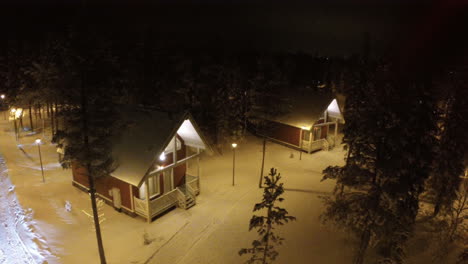 flying over guest houses in winter holiday village