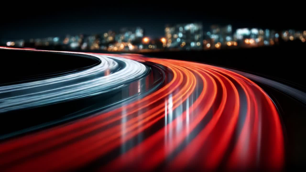 Captivating Nighttime Long Exposure of Car Lights Creating Dynamic Trails Against a Blurred Cityscape, Showcasing Movement and Energy in Urban Environments