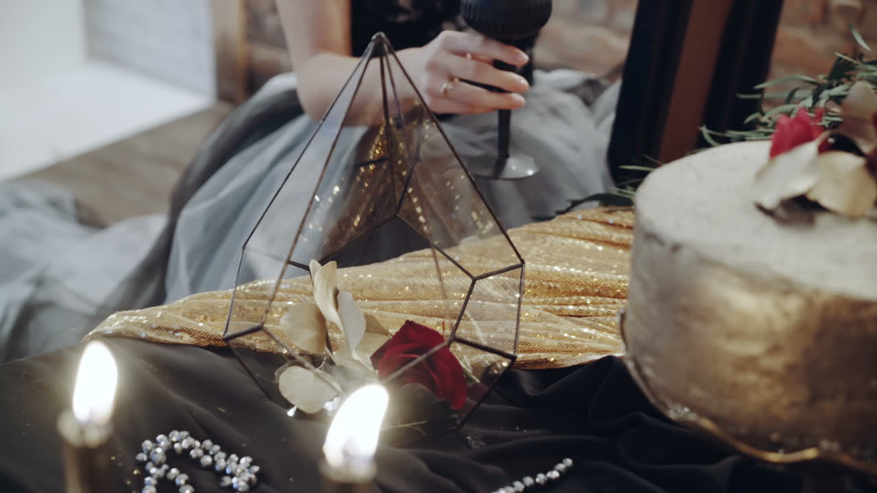 Woman with cup of wine. Portrait of young woman drinking wine in the restaurant