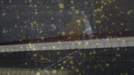 female tennis player swinging racket on hard court, displaying sports data via yellow node network