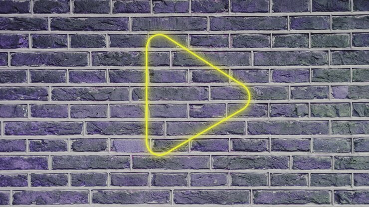 Thumbs down neon sign on brick wall 4k