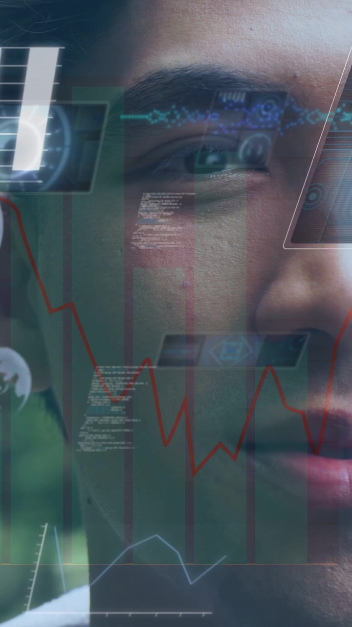 Vertical video: Adult man holding gaze while tech HUD appearing, scanning charts for ID, flaring