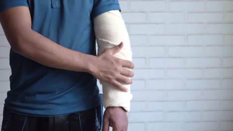 injured arm with bandage