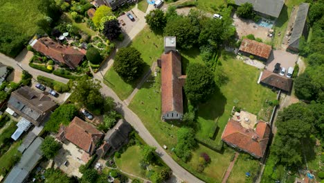 A-high-up-dolly-shot-of-St-Margaret-of-Antioch-church-in-Womenswold