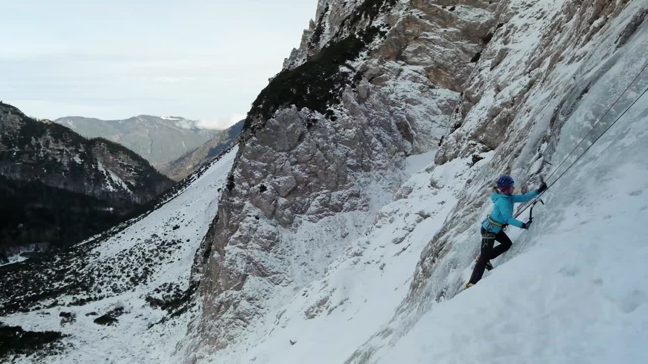Ice Climbing in Slovenia in the Julian Alps and Triglav National Park. Frozen waterfall near Vrsic.